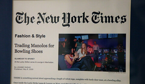 Photograph of framed New York Times Fashion & Style article highlighting Lucky Strike