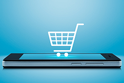 Shopping Card on top of Cell phone