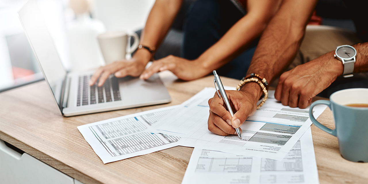 Couple working on paperwork.