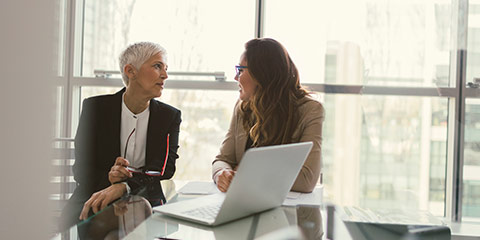 Female advisor speaking with client.