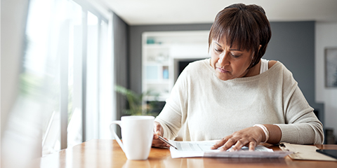 Woman looking at papers