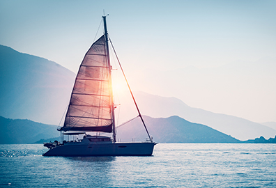 Sail boat on a calm lake